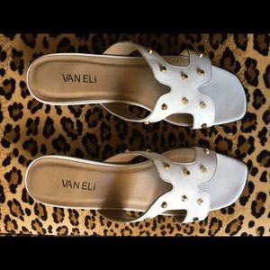Like new Vaneli slides. Size 8.5 white leather with gold nail heads.